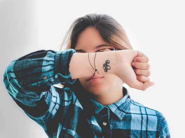 tattoo,immunity,Tattoos,Health,Fashion,Life and style,titanium dioxide,lymph nodes,titanium dioxide,tattoo parlour,tiny particles,blood stream,getting face tattoo,tattoo ink,Tattoo cancer,man getting face,toxic impurities,cause cancer,nano form