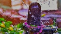 Sawan 2023: क्या शिवलिंग पर चढ़ा जल पी सकते हैं? जानें शिव पुराण का नियम