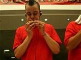 Joey Chestnut Conquers Pizza-Eating Record