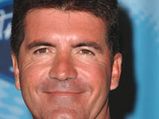 Simon Cowell Sits On Pillows To Look Taller On TV!