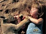 Real Life Mowgli Cuddles Elephants, Leopards & Ostriches