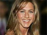 Aniston Flaunts Her Pooch And Toned Legs