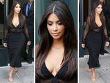 Kim Kardashian's Cleavage Peeks Out Of Sheer Top