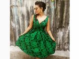 Lisa Ray Brings Back Old-School Glam In A Midi Dress & Sunnies