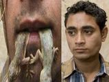Ewww!! Can You Believe This Man Eats Lizards Every Single Day!