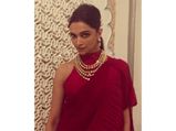 Deepika Padukone's Contemporary Red Sari Should Be Your Next Cocktail Party Wear