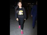 Rani Mukerji's Airport Look Includes Bright Pink Sneakers And A Quirky Top 