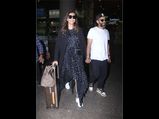Sonam Kapoor Ahuja Keeps It Stylish With A Long Asymmetrical Dress At The Airport