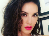 Sunny Leone Spices Up The Basic Look With A Wild Cherry Lip