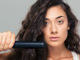 How To Perfectly Curl Your Hair Using A Flat Iron