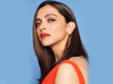 Deepika Padukone Keeps It Simple With Her Orange Dress But Still Catches Our Attention
