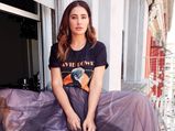 Nargis Fakhri Gives Fashion Tip On How To Ace Casual Tee By Pairing It With Pretty Skirt And Boots
