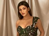 Yashika Aannand Gives Fashion Goals In Olive Green Saree Gown For The Upcoming Wedding Season