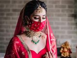 This Bride Looks Gorgeous In Her Red Lehenga But Creates Trend With Her Complementing Mask