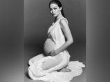 Gigi Hadid Takes The Internet By Storm With Her Baby Bump Photoshoot In A Dress