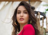 Nora Fatehi Transforms Herself Into A Barbie Doll Of 2099 And Creates Buzz With Her All-Purple Look