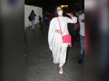 Airport Fashion: Sara Ali Khan Flaunts An Ivory Chikankari Suit And Neon-Pink Jewellery Look