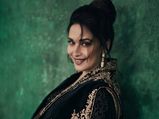 Madhuri Dixit Teams Her Black Georgette Saree With Lace Blouse, Cape And Belt And We’re Taking Fashion Notes!