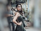 99 Songs: Lisa Ray Gives Us A Gentle Peek Of Her Character In A Stunning Layered Green Gown