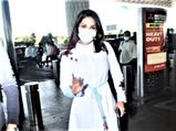 Airport Fashion: Sunny Leone's Asymmetrical White Dress Is Super Comfy For A Summer Day Out!