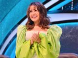 Style Alert! Neha Kakkar Teams Her Favourite Green Dramatic Dress With Black Boots And It’s A Perfect Match