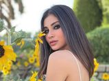 Mouni Roy Rocks Bold Smokey Eyes Makeup Look As She Takes A ‘Detour’ To A Sunflower Garden