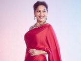 Madhuri Dixit Oozes Glamour And Elegance In Her Multicolour Striped Saree; Here’s How Much It Costs!