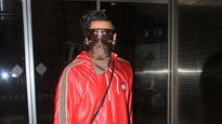 Airport Fashion: Ranveer Singh Amazed Us With His Dazzling Entry In A Red Leather Hoodie And Velvet Trousers