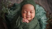 Why Do Newborns Smile In Their Sleep?