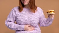 Why Your Stomach Feels Tight After a Normal Meal, Expert Explains