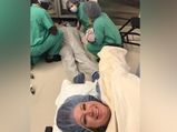 Mum Snaps Hilarious Delivery Room Selfie As Her Husband Passes Out While She Is Giving Birth