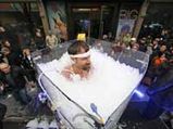 Ice Man Endures Cold For Fun