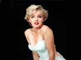 Marilyn Monroe's Pink Satin Gown Create Waves In Auction!