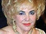 Elizabeth Taylor Buried With Her Love