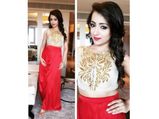 Trisha Krishnan Goes Red In Archana Rao At A Promotional Event