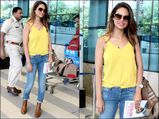 Travel Look: Esha Gupta In Sunshine Hues And Cowboy Boots