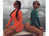 Kim Kardashian Flaunts Her Booty In An Orange Dress In Mexico