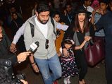 Aishwarya Adds A Giant Black Hat To Her Airport Look & Looks Great