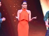 Kriti Flaunts Her Tangerine Corporate Look At Raabta Promotions