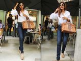 Shilpa Flaunts Her Perfect Figure In a White Shirt And Dark Blue Jeans