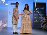 Neha Dhupia Flaunts Her Baby Bump As She Graces The Ramp With Angad Bedi In Floral Outfits At LFW