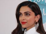 Deepika Padukone Oozes Elegance With Her White Ensemble And Chandelier Earrings