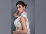 Mouni Roy Is A Picture Of Elegance In This White Belted Sari