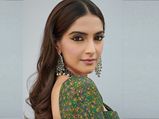 Sonam Kapoor Ahuja Looks Dramatically Sophisticated In An Emerald Floral Rush Sari And Blouse