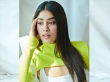 Janhvi Kapoor Stylishly Slays In Ivory Co-ords And Neon Green Cropped Sweater