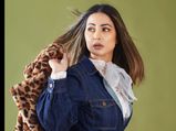 Hina Khan Adds A Stylish Twist To Her INR 5500 Denim Jumpsuit With Leopard Fluffy Jacket And Ruffle White Top