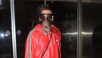 Airport Fashion: Ranveer Singh Amazed Us With His Dazzling Entry In A Red Leather Hoodie And Velvet Trousers