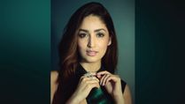 A Thursday Actress Yami Gautam Dhar Looks Resplendent In Black And Green Gown
