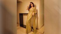 Rhea Chakraborty Looks Classy And Elegant In This Golden Sequin Saree!