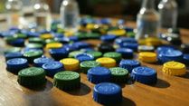 Cracking The Cap Code : Do You Know The Hidden Meaning Behind The Colours Of Water Bottle Caps?
